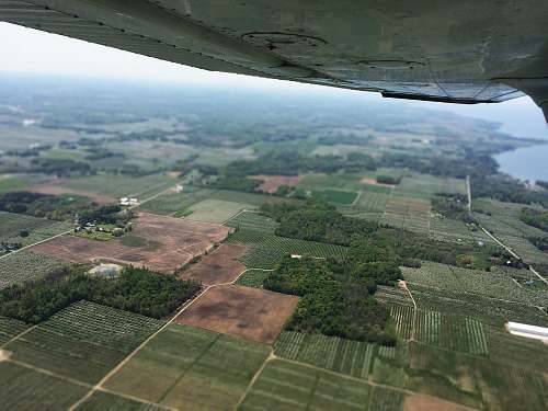 aerial view areal photography of green field nature